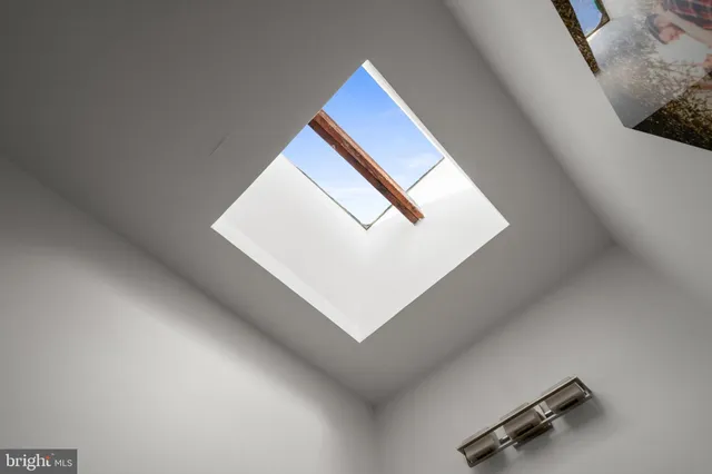 a view of staircase with white walls