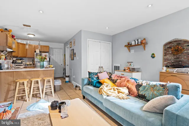 a living room with furniture and a couch