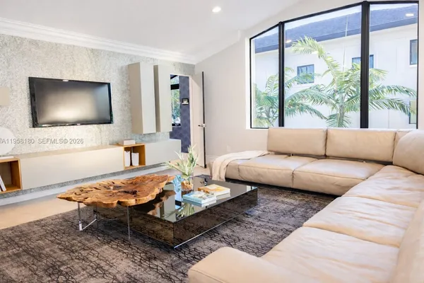 a view of a house with a yard porch and sitting area