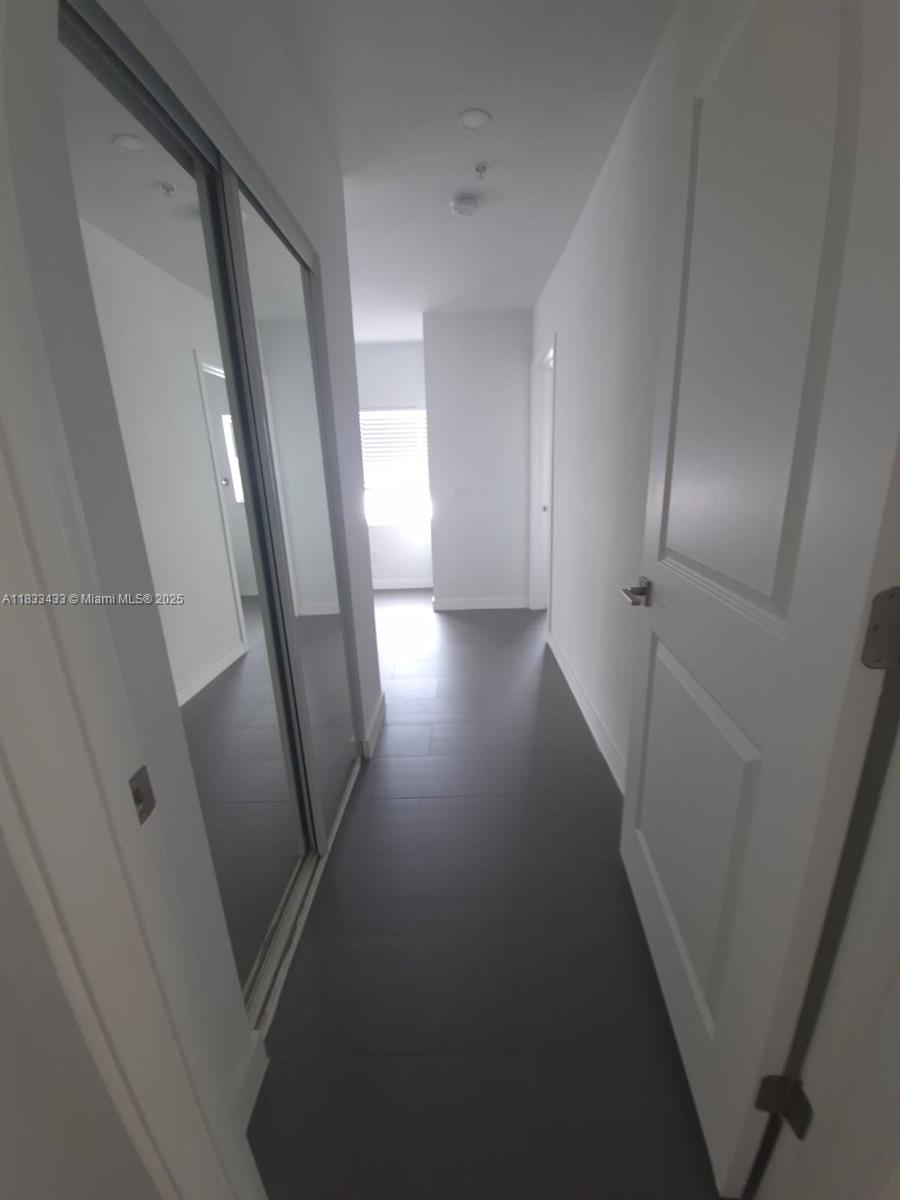 1211 Euclid Avenue, Unit 11 Miami Beach, FL 33139 - Photo 15 of 19 a view of a hallway
