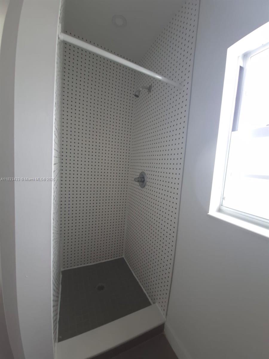 1211 Euclid Avenue, Unit 11 Miami Beach, FL 33139 - Photo 19 of 19 a bathroom with a shower