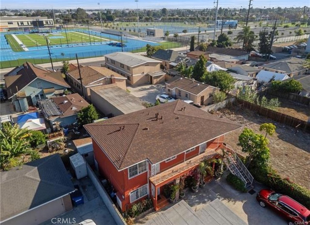 an aerial view of a house with a outdoor space