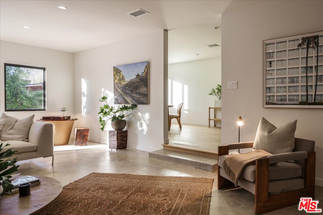 4119 Aralia Road Altadena, CA 91001 - Photo 11 of 37 a living room with furniture and wooden floor