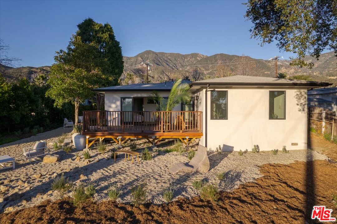 4119 Aralia Road Altadena, CA 91001 - Photo 28 of 37 front view of a house with a large tree