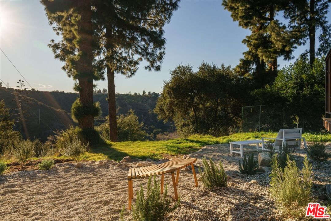 4119 Aralia Road Altadena, CA 91001 - Photo 33 of 37 a view of a swimming pool with a garden