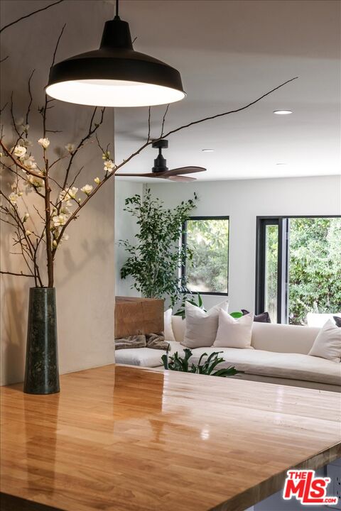 4119 Aralia Road Altadena, CA 91001 - Photo 8 of 37 a living room with furniture and a large window