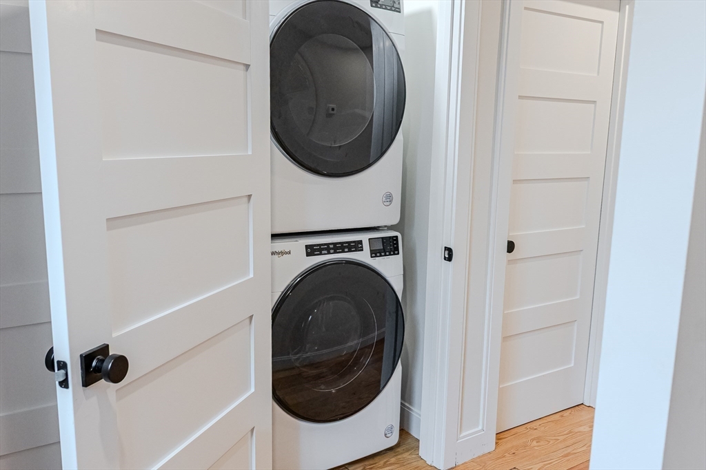 1-7 Wilcutt Road, Unit 5 Boston, MA 02121 - Photo 16 of 24 a utility room with dryer and washer