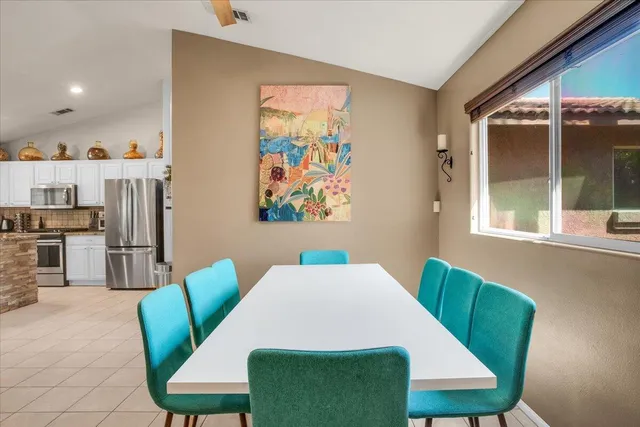 a view of kitchen with furniture and large window