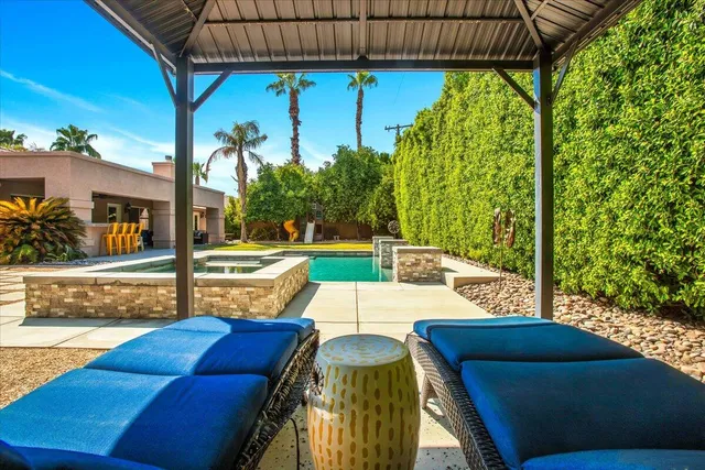 a view of an outdoor space with seating area