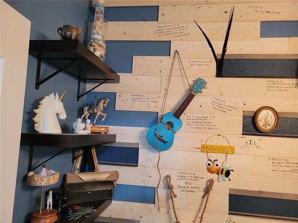 a view of livingroom with furniture and toys