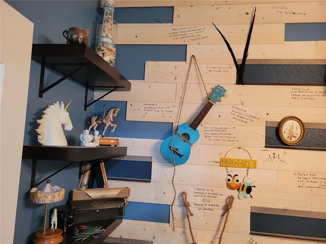 a view of livingroom with furniture and toys