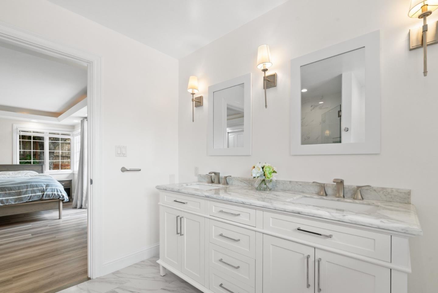 770 Graham Hill Road Santa Cruz, CA 95060 - Photo 45 of 83 a bathroom with a granite countertop sink and a mirror
