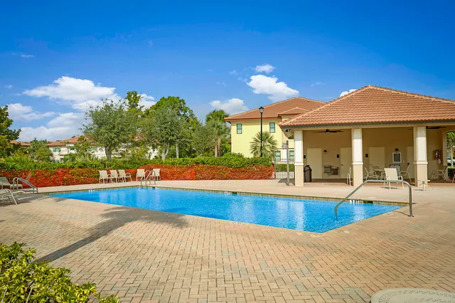a view of a house with swimming pool