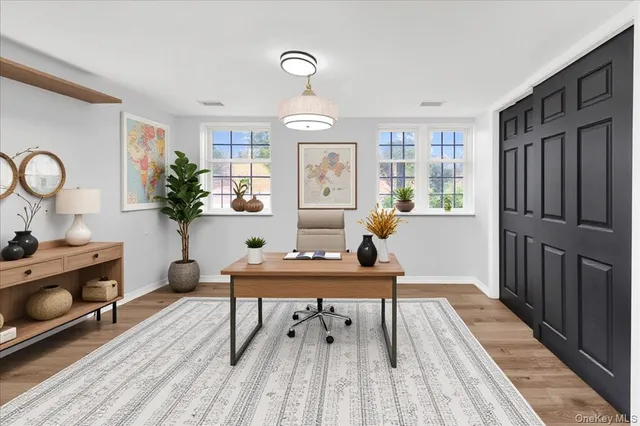 a workspace with wooden floor