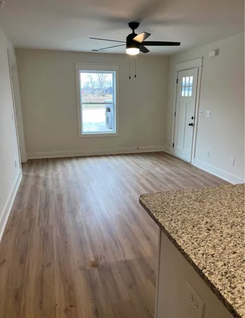 a view of an empty room and window