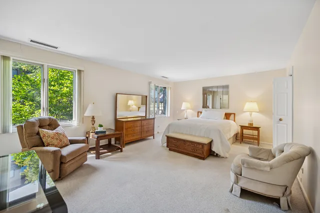 a bedroom with furniture and a couch