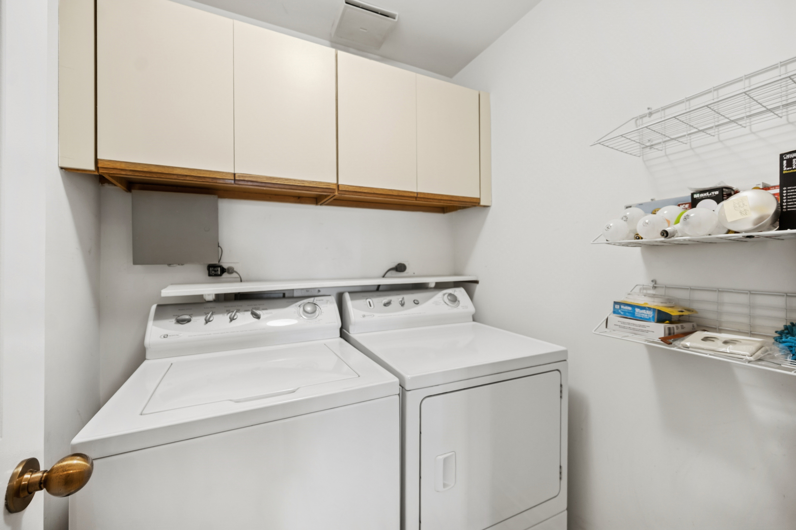2000 Chestnut Avenue, Unit 103 Glenview, IL 60025 - Photo 21 of 27 a utility room with dryer and washer