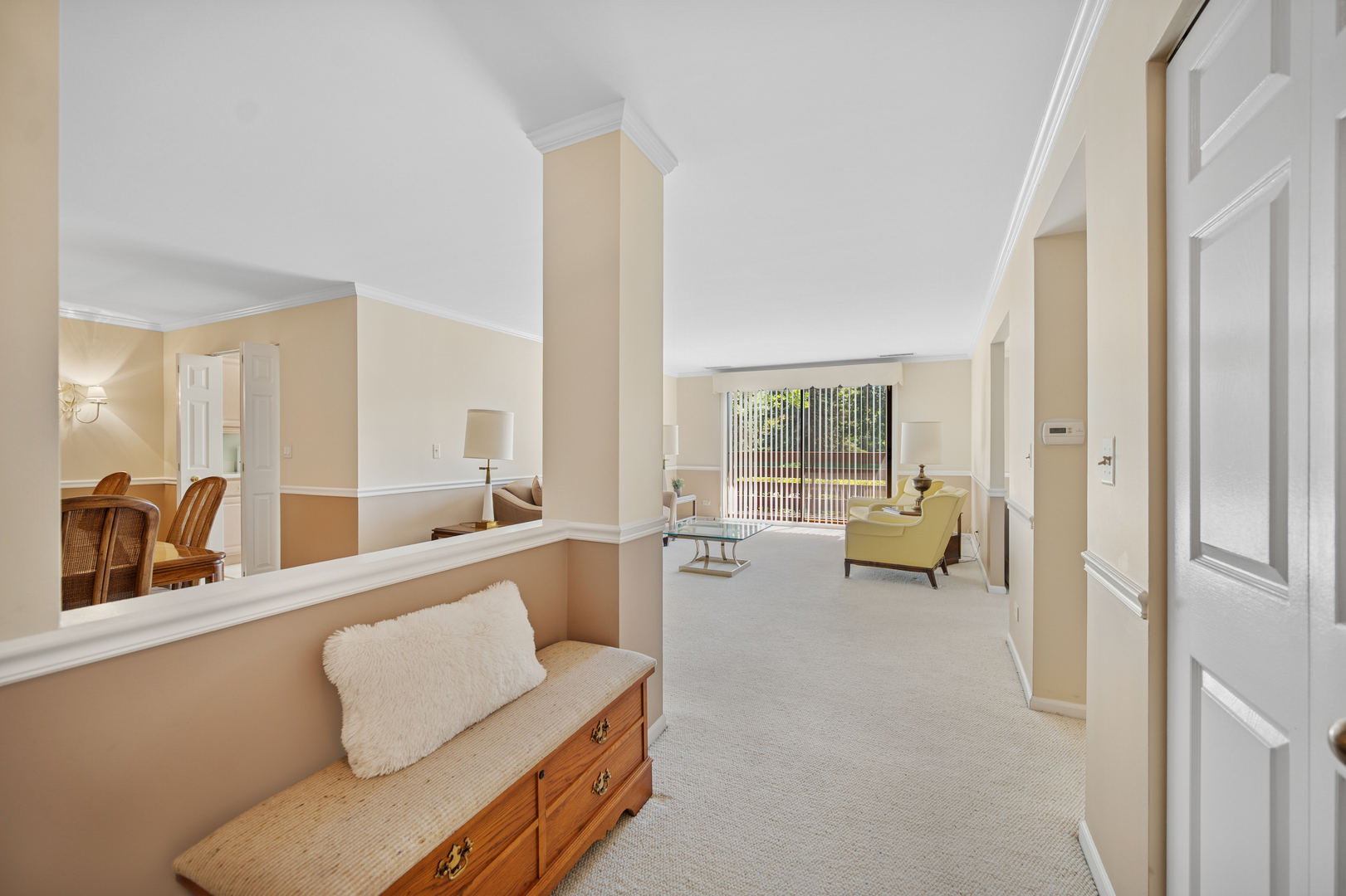 2000 Chestnut Avenue, Unit 103 Glenview, IL 60025 - Photo 5 of 27 a living room with furniture and a large window with outer view