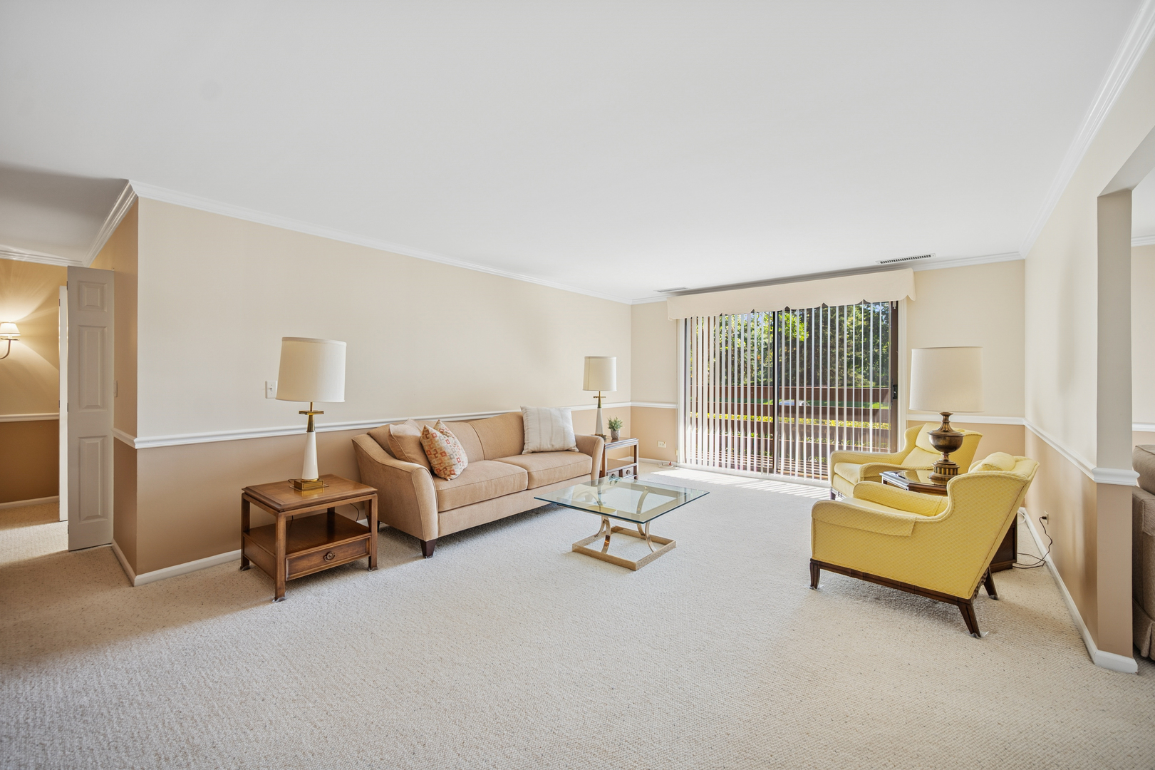 2000 Chestnut Avenue, Unit 103 Glenview, IL 60025 - Photo 6 of 27 a living room with furniture and floor to ceiling window