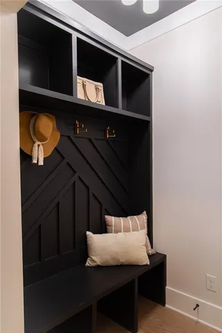 a bathroom with a toilet sink and shower