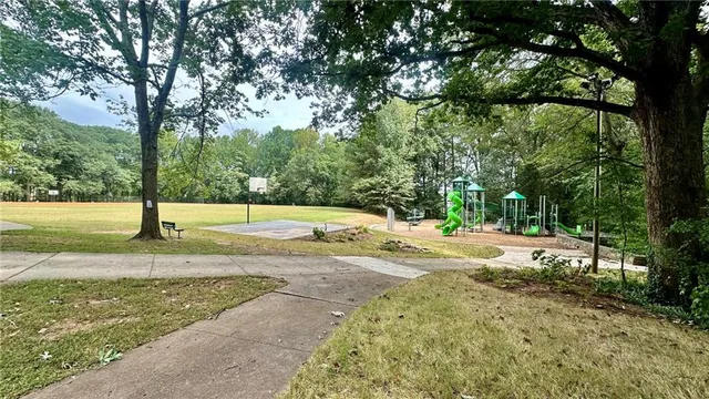 a view of a balcony with trees
