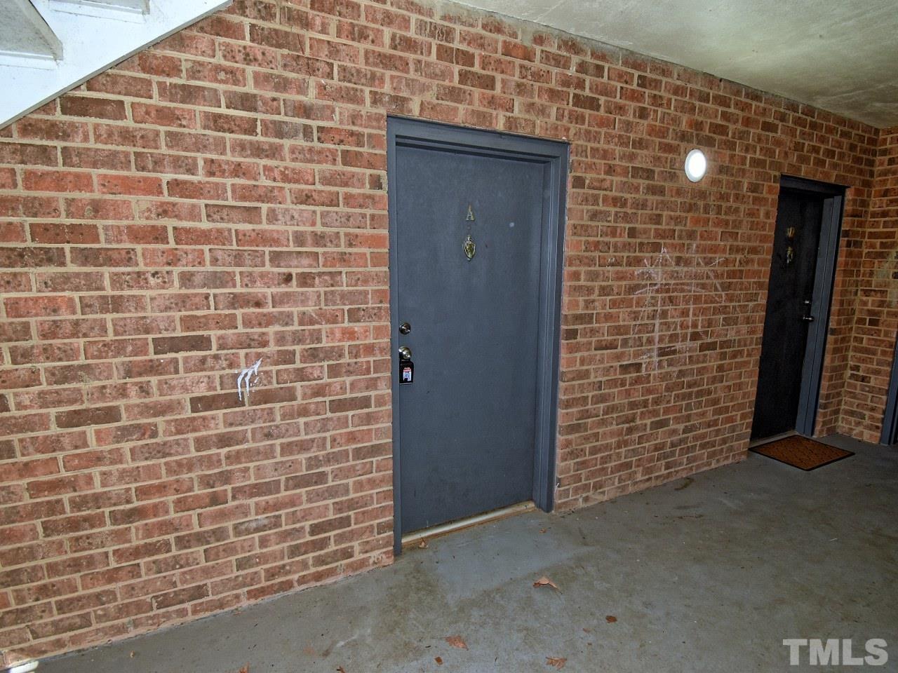 1000 Sandlin Place, Unit A Raleigh, NC 27606 - Photo 14 of 17 a view of door