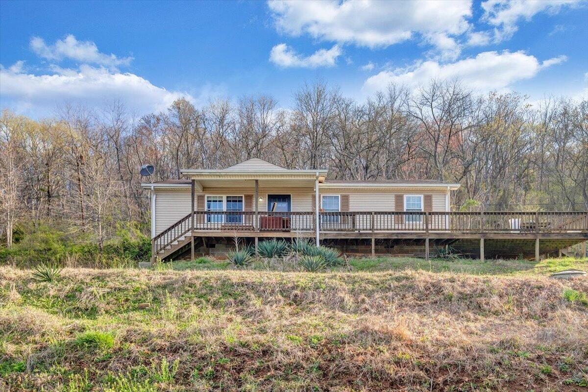 602 River Road Madison Heights, VA 24572 - Photo 1 of 24 a backyard of a house with table and chairs