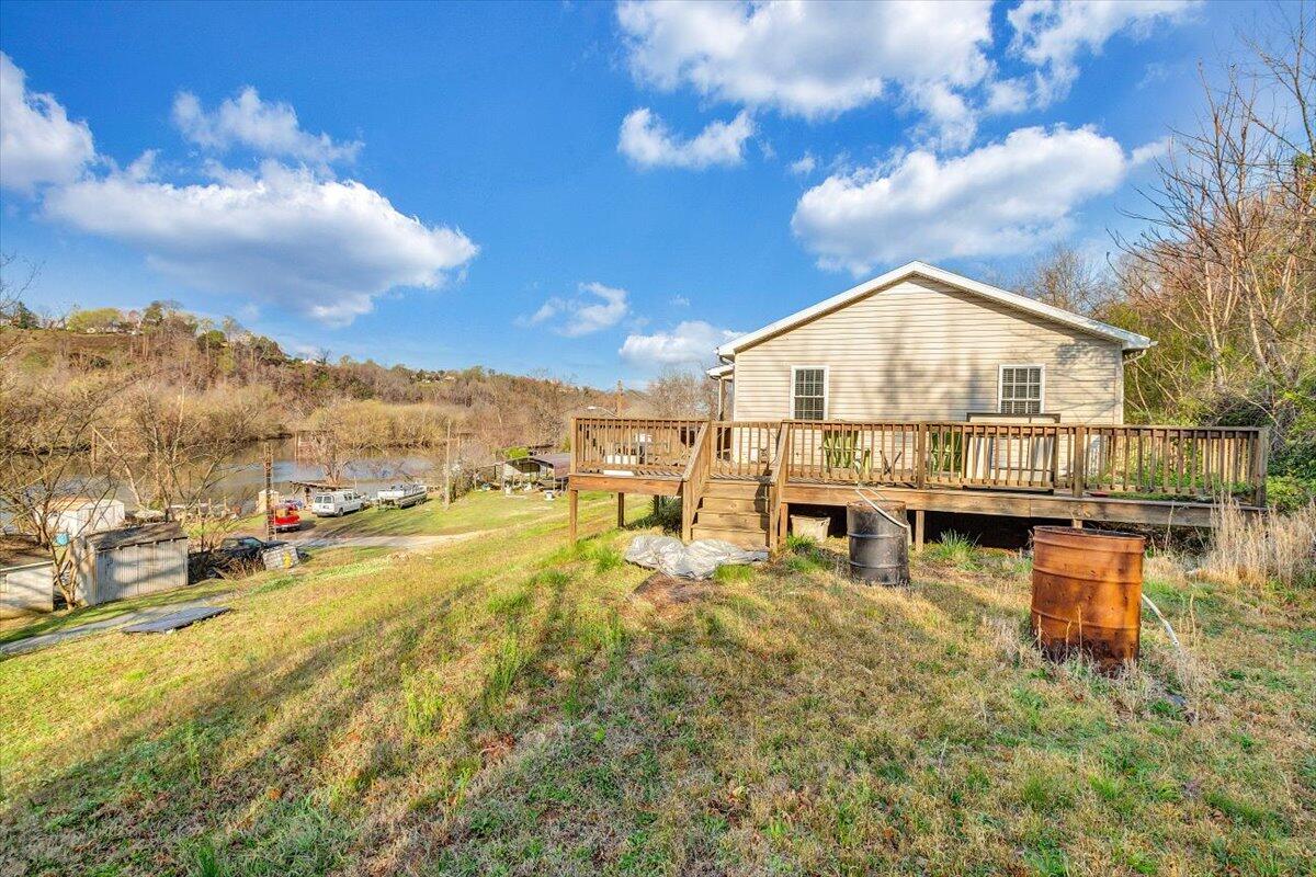 602 River Road Madison Heights, VA 24572 - Photo 21 of 24 a view of a lake with a house in the background