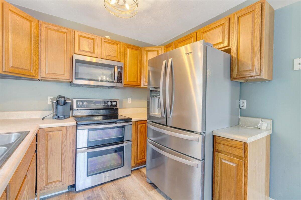 602 River Road Madison Heights, VA 24572 - Photo 8 of 24 a kitchen with stainless steel appliances granite countertop a refrigerator and a stove top oven