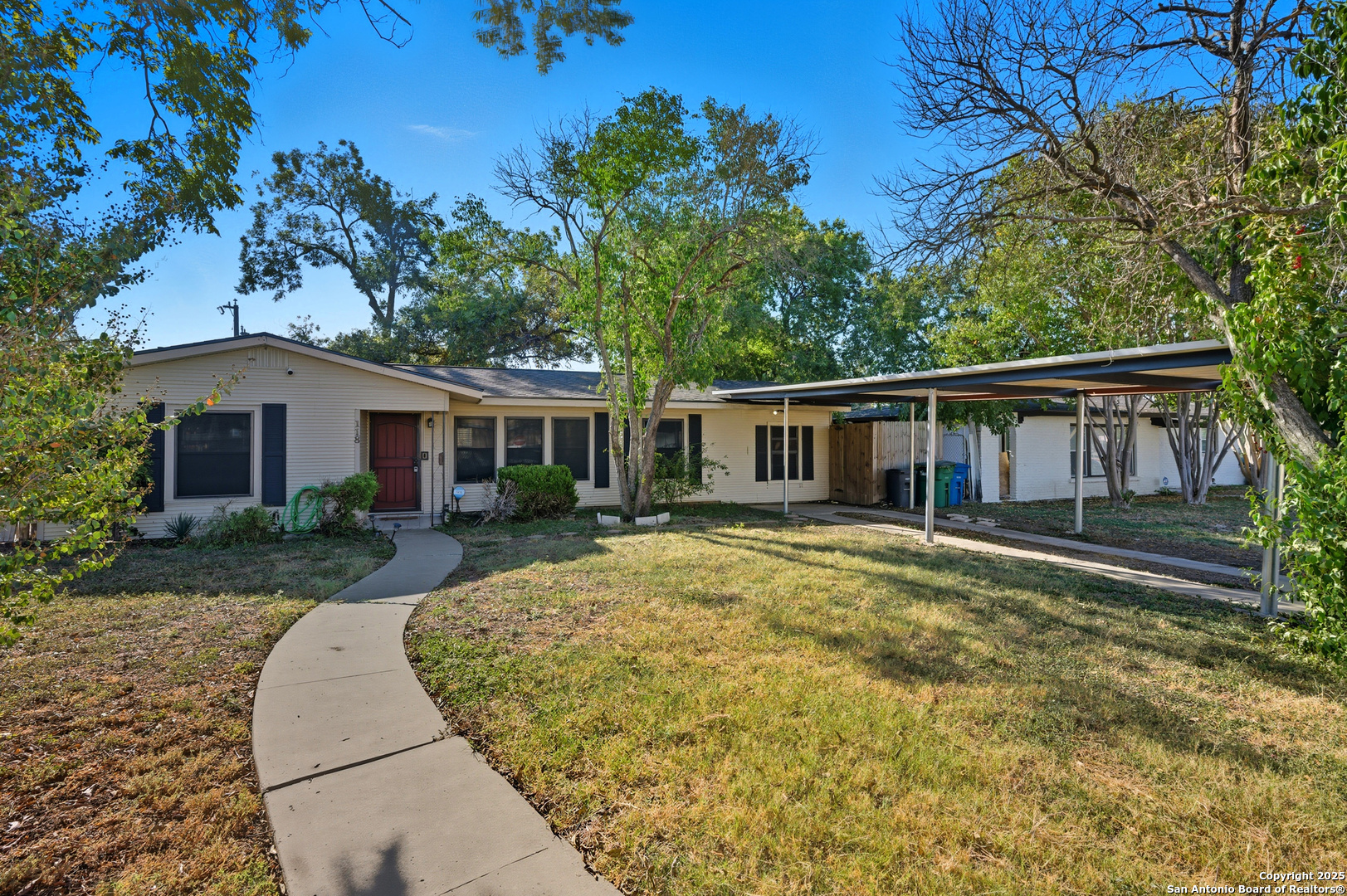 118 Raleigh Place San Antonio, TX 78201 - Photo 2 of 25 a view of a house with a yard