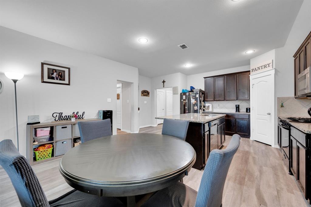 2609 Centurion Road Glenn Heights, TX 75154 - Photo 10 of 29 Dining space with light wood-style floors and recessed lighting