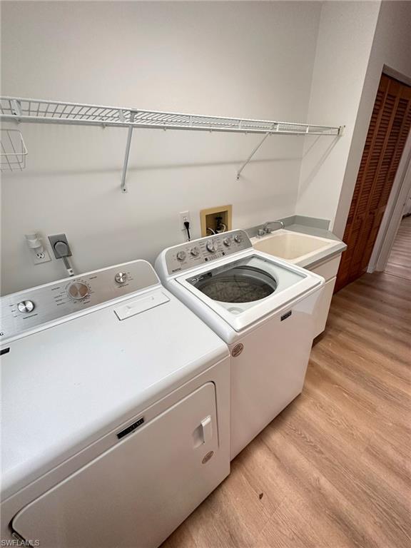 18475 Evergreen Road Fort Myers, FL 33967 - Photo 23 of 30 a utility room with dryer and washer