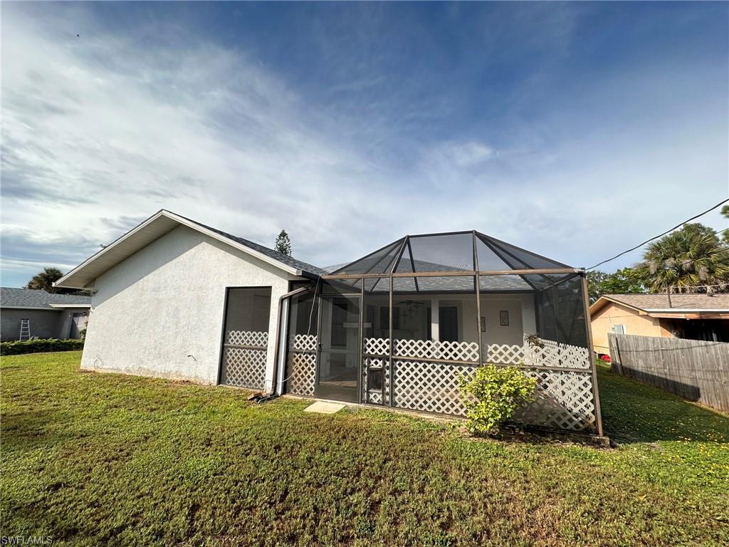 18475 Evergreen Road Fort Myers, FL 33967 - Photo 29 of 30 a front view of a house with a yard