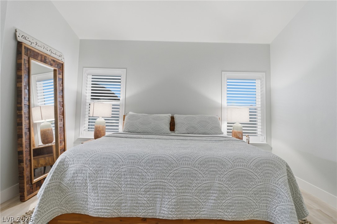 239 Highgate Street Henderson, NV 89074 - Photo 24 of 44 Retreat to a spa-inspired primary suite featuring a soaking tub, a beautifully tiled walk-in shower, dual vanities with upgraded countertops, & a spacious walk-in closet.