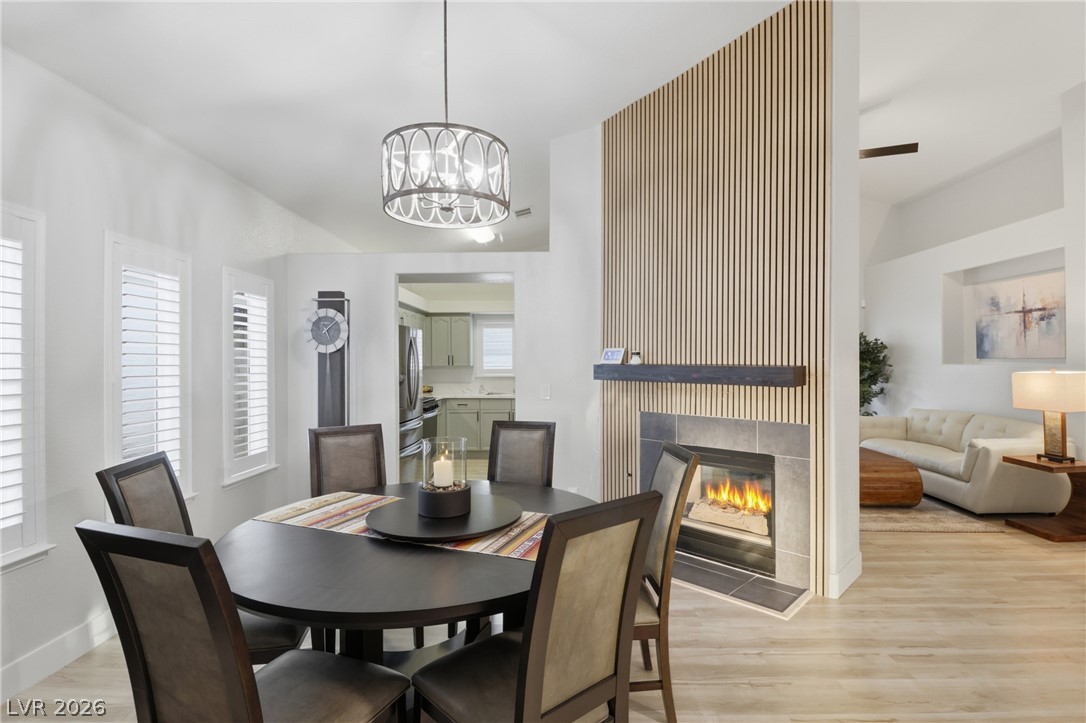 239 Highgate Street Henderson, NV 89074 - Photo 3 of 44 Fall in love with this completely remodeled Green Valley single-story retreat, tucked away on a private cul-de-sac. Step inside to find soaring ceilings, elegant new flooring, new baseboards, fresh paint, new shutters, & custom designer fixtures.