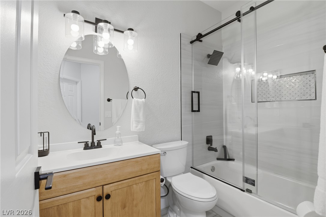 239 Highgate Street Henderson, NV 89074 - Photo 33 of 44 Generously sized secondary bedrooms offer comfort/flexibility, including a fully transformed secondary bathroom with contemporary finishes.