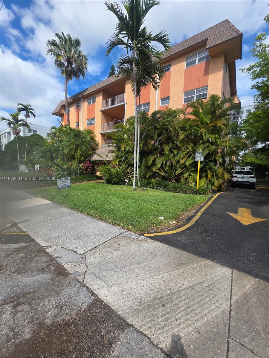 8101 Southwest 73rd Avenue, Unit 17 Miami, FL 33143 - Photo 20 of 66 a view of a house with a yard