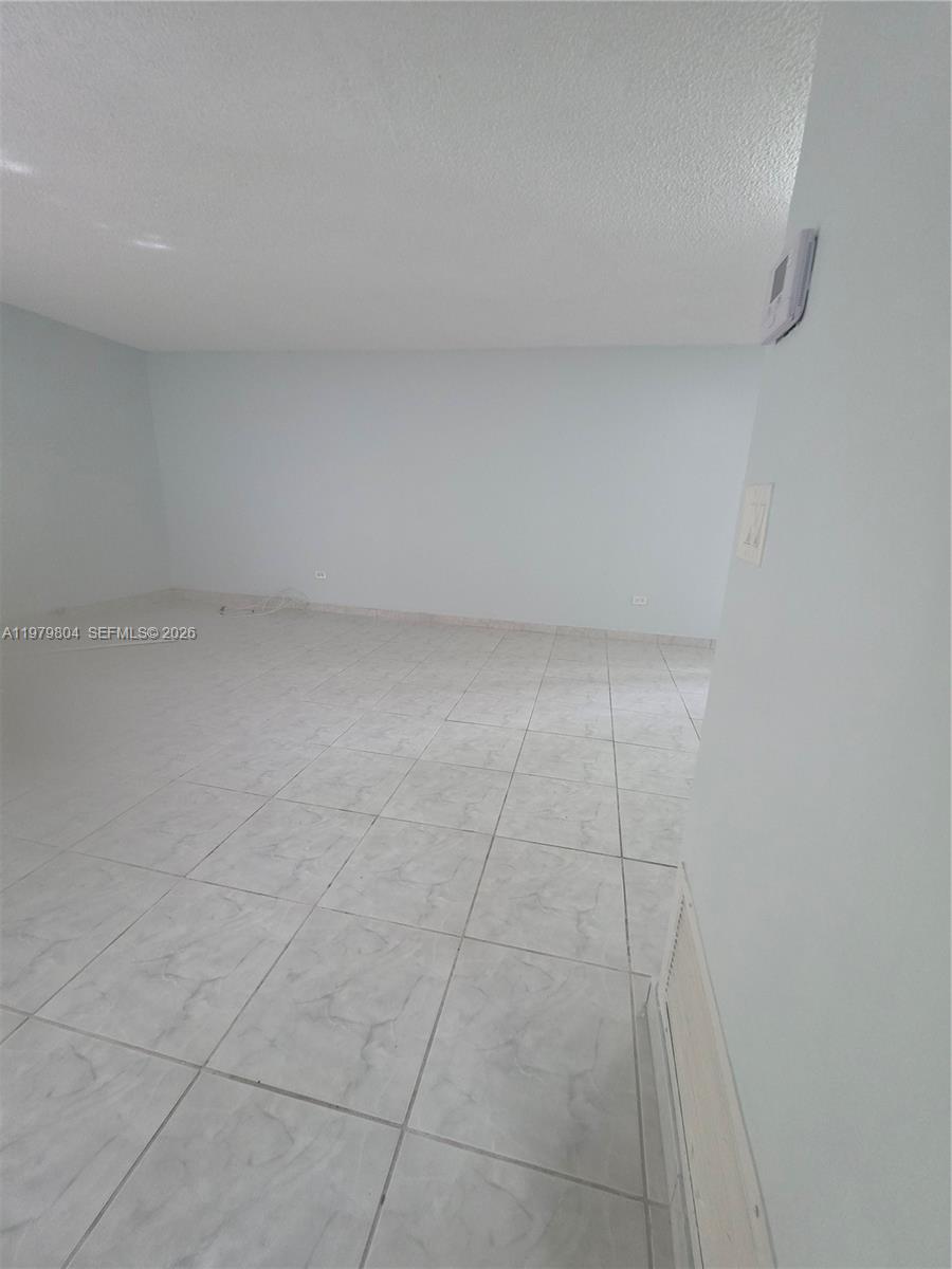 8101 Southwest 73rd Avenue, Unit 17 Miami, FL 33143 - Photo 33 of 66 a view of a refrigerator in a room