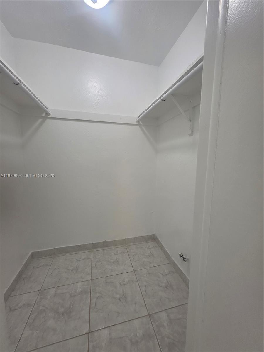 8101 Southwest 73rd Avenue, Unit 17 Miami, FL 33143 - Photo 41 of 66 a view of a room with white walls