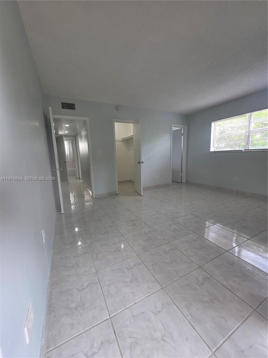 8101 Southwest 73rd Avenue, Unit 17 Miami, FL 33143 - Photo 44 of 66 a view of a livingroom with a staircase