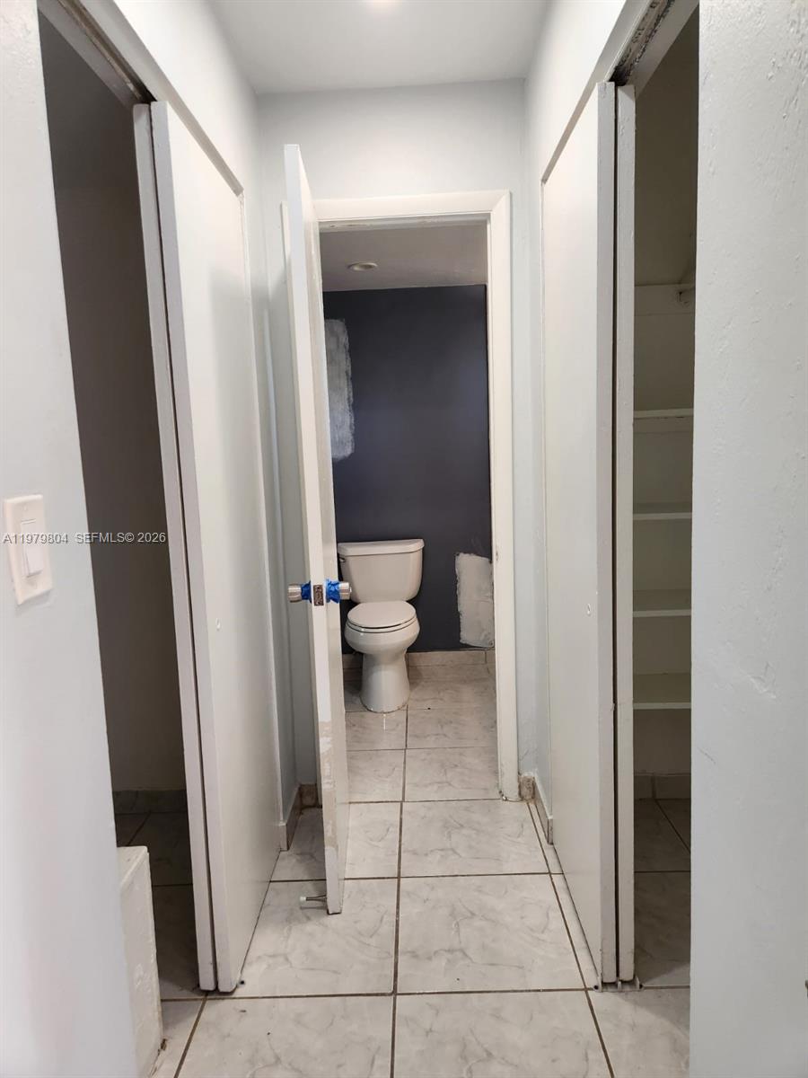 8101 Southwest 73rd Avenue, Unit 17 Miami, FL 33143 - Photo 5 of 66 a view of a bathroom from a gallery