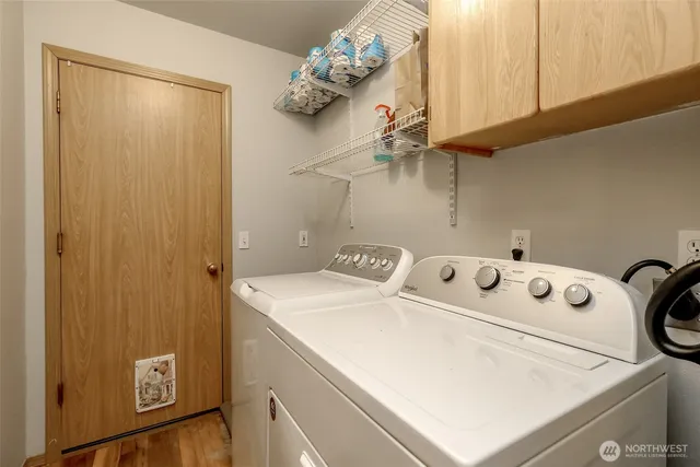a utility room with dryer and washer