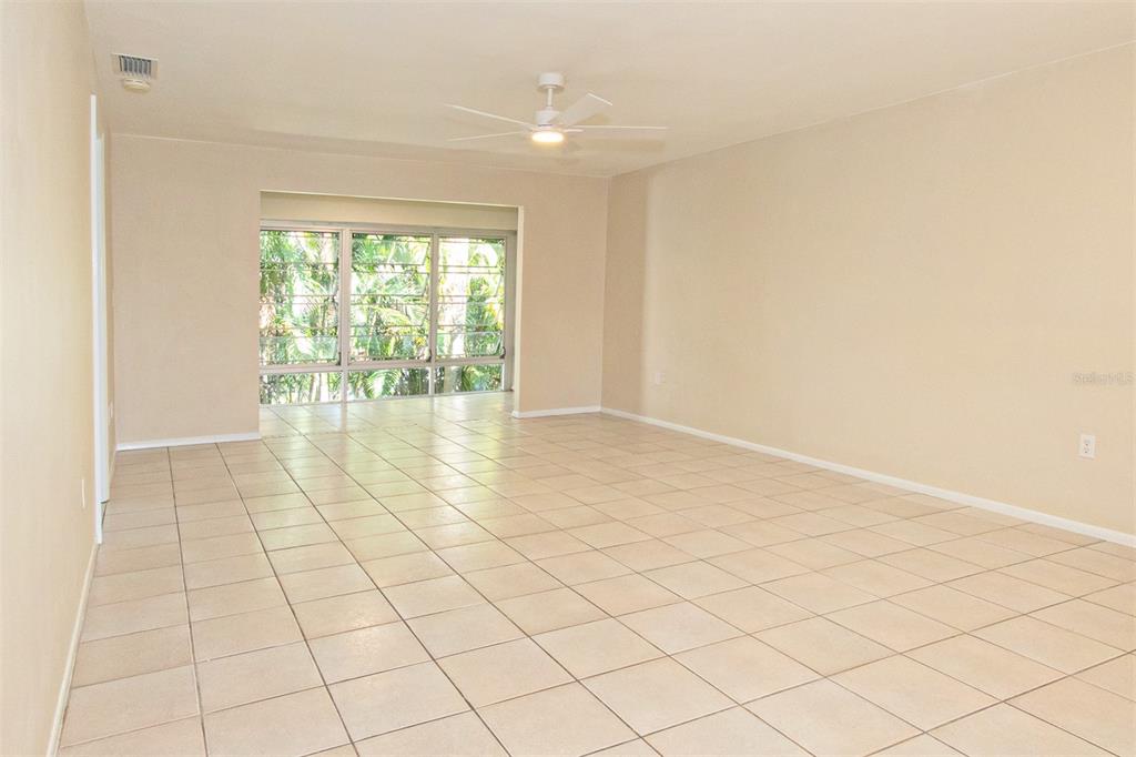 1433 South Belcher Road, Unit F11 Clearwater, FL 33764 - Photo 5 of 21 a view of an empty room and window