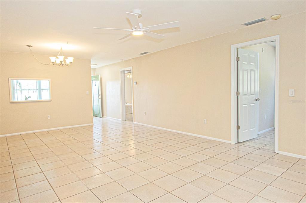 1433 South Belcher Road, Unit F11 Clearwater, FL 33764 - Photo 7 of 21 a view of an empty room and window