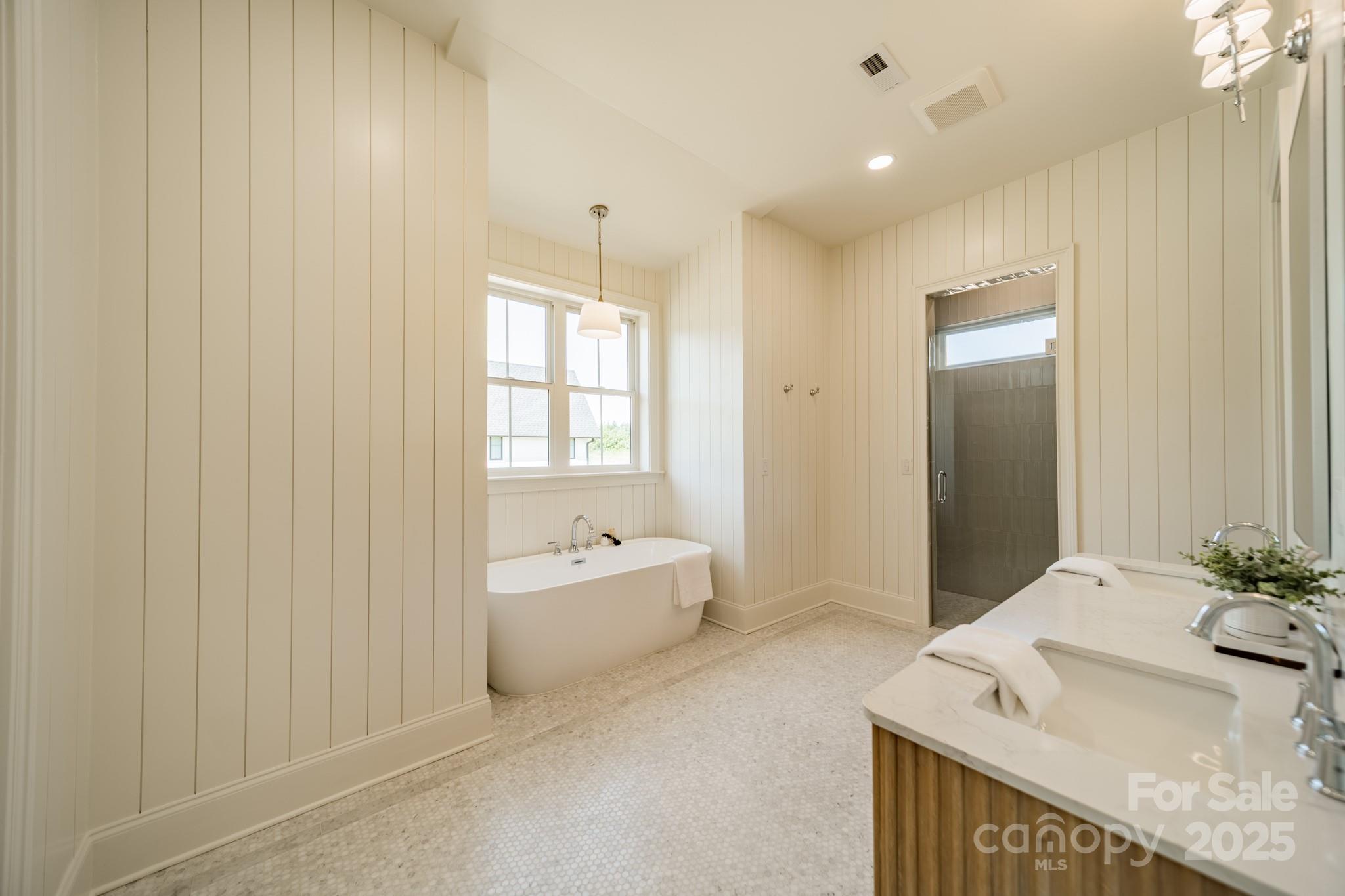 2346 Bridgewater Road, Unit 7 Rock Hill, SC 29730 - Photo 20 of 34 a spacious bathroom with a bathtub sink and mirror
