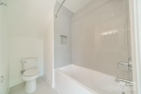 a outdoor space with patio the couches and a dining table with garden view