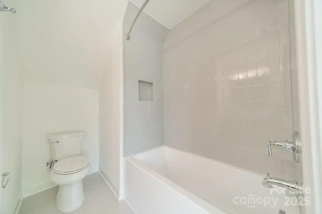 a outdoor space with patio the couches and a dining table with garden view