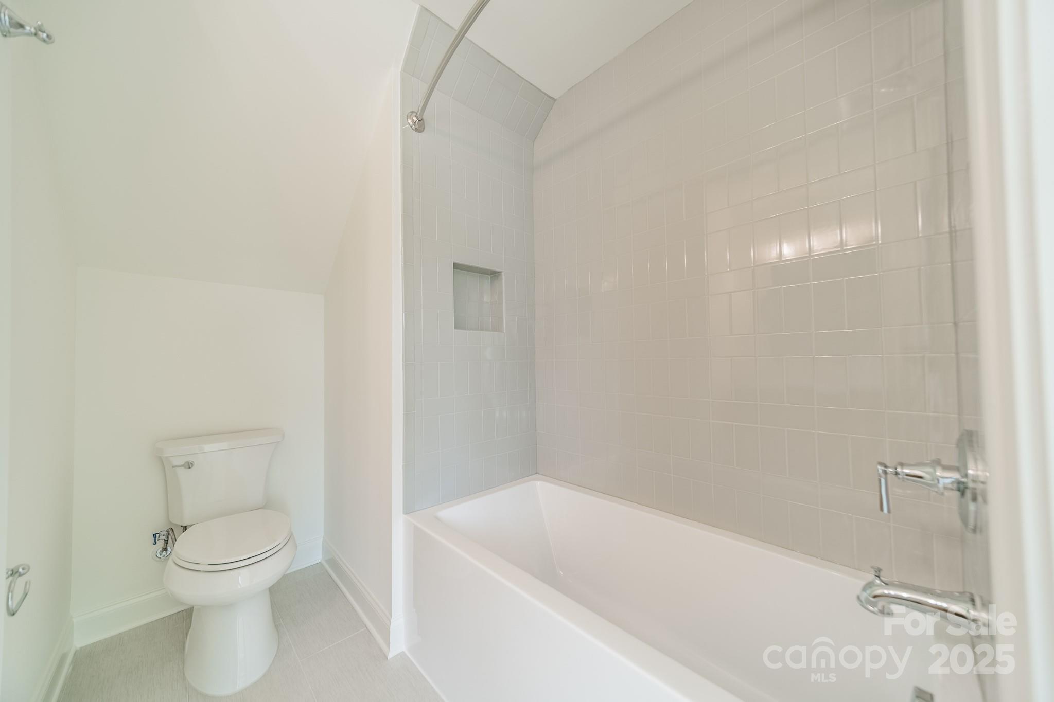 2346 Bridgewater Road, Unit 7 Rock Hill, SC 29730 - Photo 31 of 34 a bathroom with a toilet and a bathtub