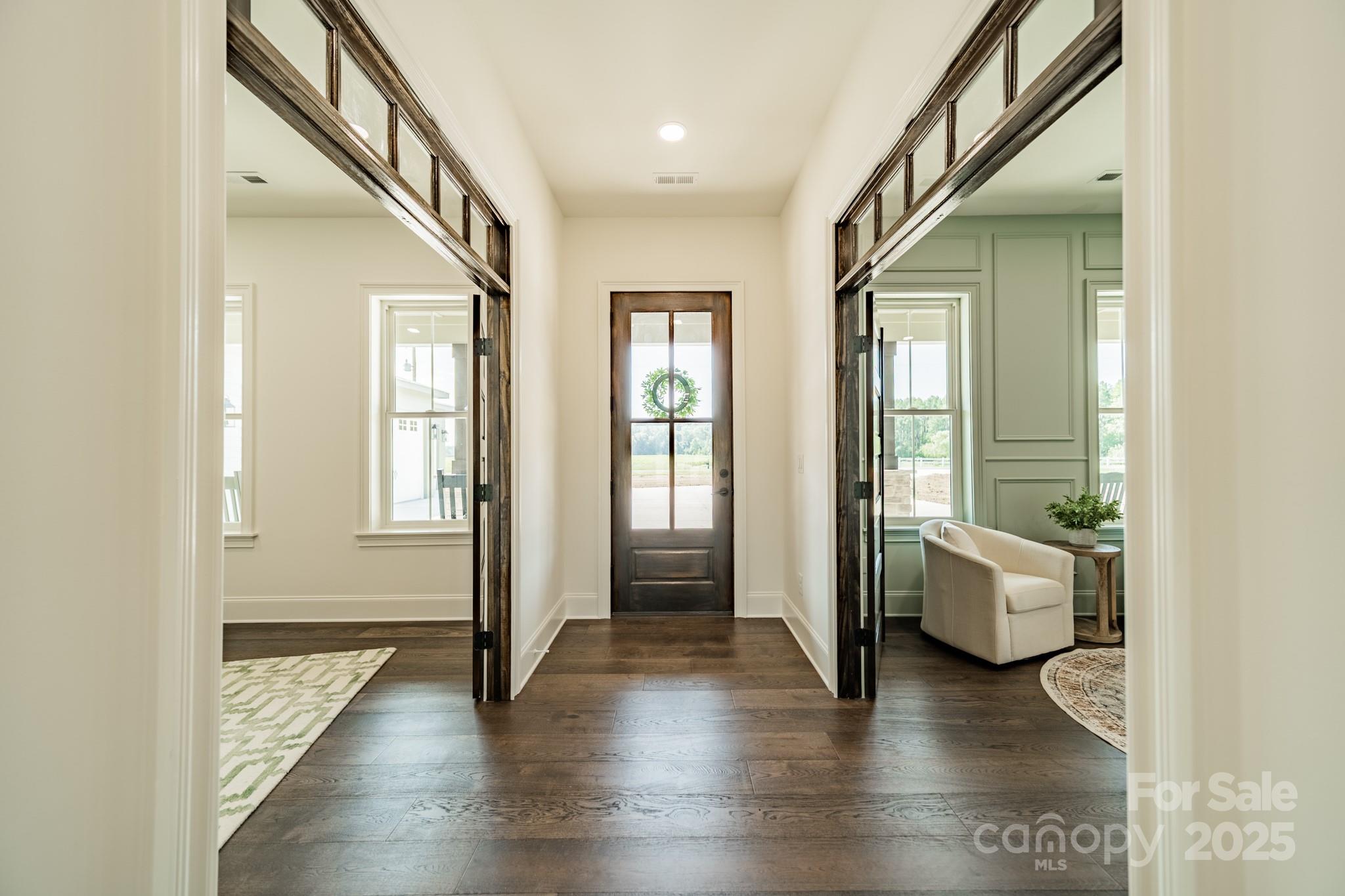 2346 Bridgewater Road, Unit 7 Rock Hill, SC 29730 - Photo 5 of 34 a hallway with wooden floor and stairs