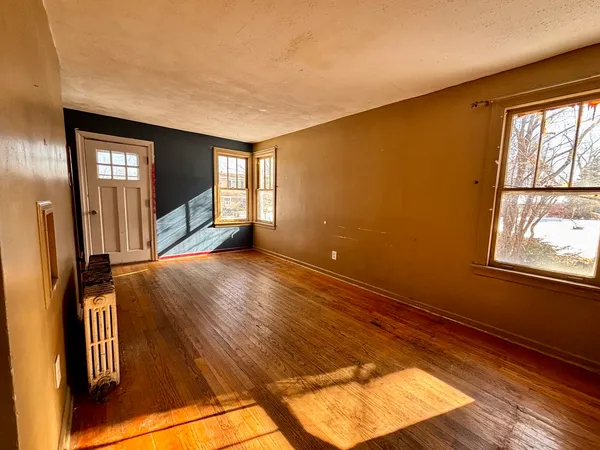 a view of an empty room and window